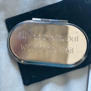 Engraved compact mirror